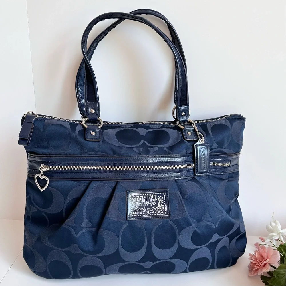 Coach “daisy signature